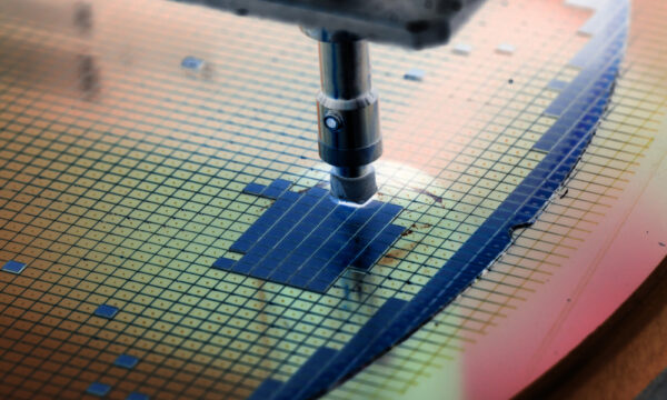 Silicon wafer in die attach machine during semiconductor manufacturing process