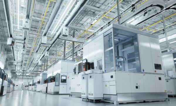 Bright interior of modern semiconductor production facility utilizing linear slide technology